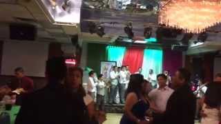 Ojos azules con banda santa Cecilia de queens 2014