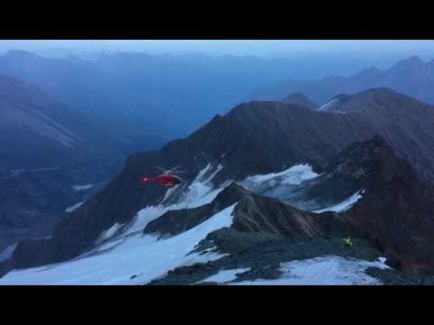 Man Barely Dodges An Out Of Control Rescue Helicopter As It Crashes Into Mountain