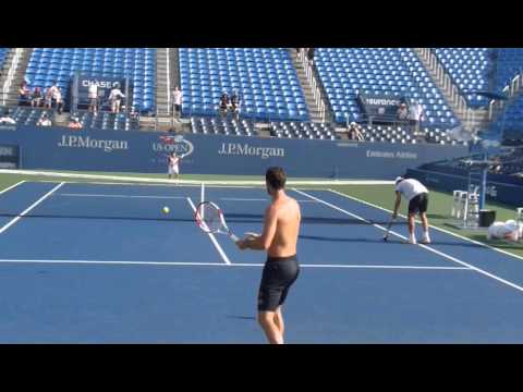Michael Llodra and his son play tennis