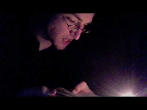 Harry Leavey reads Sherlock Holmes by candlelight.