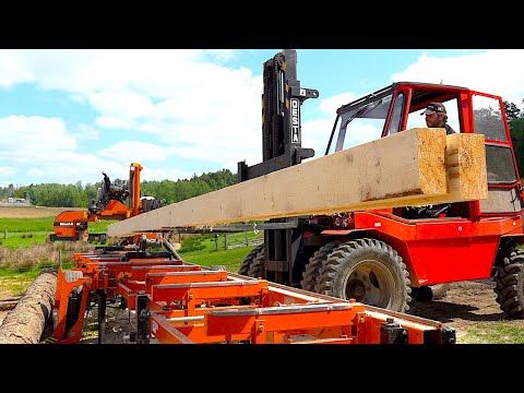 Amazing transformation of a gigantic tree into 8-m rafters for a cabin roof (Mobile sawmill)