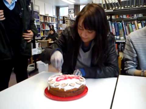 Liv cutting the cake
