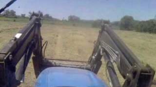 preview picture of video 'me raking hay in new holland T5050'