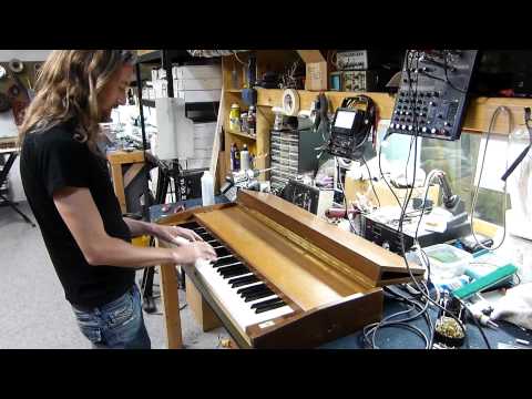 Adam MacDougall playing a Pianet with new Ken Rich Sound Services sticky pads