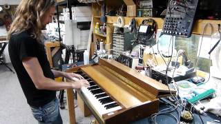 Adam MacDougall playing a Pianet with new Ken Rich Sound Services sticky pads