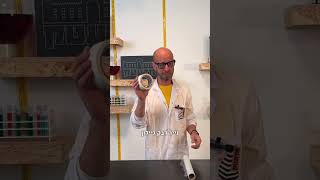 אתנחתא קוסמית עם חוויר - זכוכית מגדלת בשילוב טיפות מים
