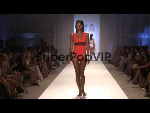 Models walk the runway during Minimale Animale - Mercedes...