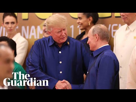 Donald Trump and Vladimir Putin shake hands at Apec