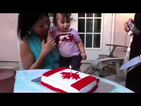 Little Cameron slaps Happy Canada Cake