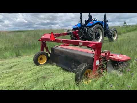 NEW HOLLAND T6050 WITH NEW HOLLAND 6030 MOWER