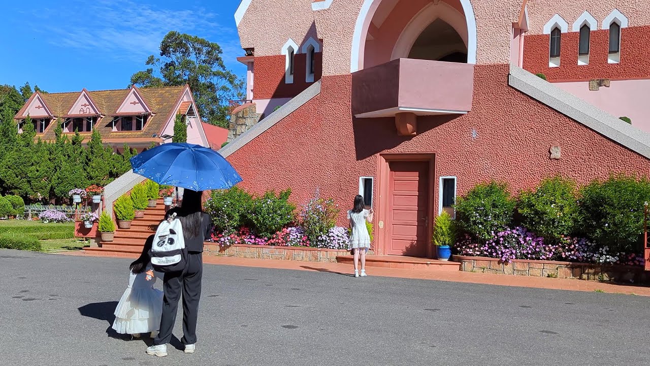 Stunning stained-glass windows and colonial-era aesthetics define the beauty of Domaine De Marie Church.