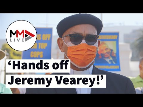 'Bring back Vearey!' Supporters march to parliament after top cop's dismissal