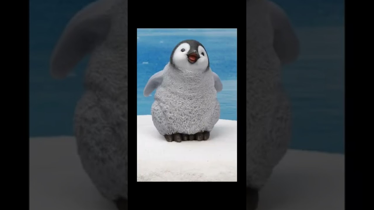 It's Baby penguin stuck in an iceberg!!!! What's a Penguin??? What's an Iceburg???