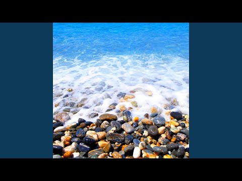 Gentle Waves on a Pebble Beach