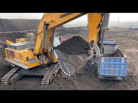 Liebherr 974 Excavator And Caterpillar 988F Wheel Loader Loading Coal On Trucks - Labrianidis Mining