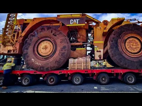 Loading and transporting catterpillar D8R bulldozer