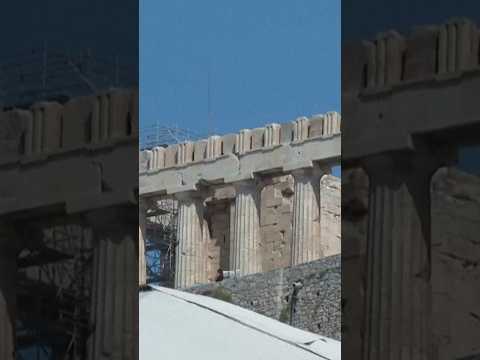A man stabbed and injured two American tourists near Greece’s top tourist attraction