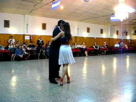  Maria Florencia Labiano  and  Hernán Rodriguez Chaile  are  dancing  to  the  tango  "  Necesito Olvidar  "