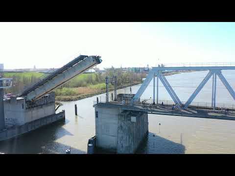 Sailing boat passes the bridge between Sliedrecht and Dordrecht