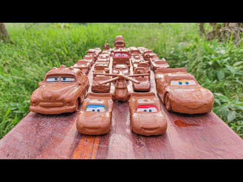Disney Pixar Cars Lightning McQueen, Natalie Certain, Dinoco | Muddy toys fall into the water