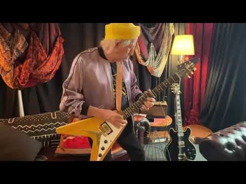 Keith Richards backstage in Hyde Park before the show - playing his Gibson Guitar - Midnight Rambler