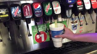 Filling up a Circle K Big Gulp With Most Of The Flavors.