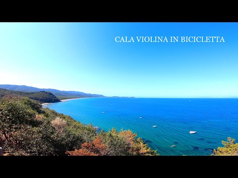 CALA VIOLINA IN BICICLETTA Sentiero Cala Civette Cala Martina Follonica con vista sull'isola d'Elba