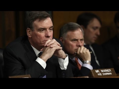 Warner: Clinton is 'jumping to a conclusion'