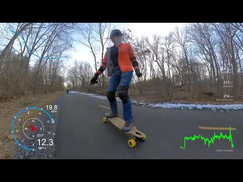 Pumping fast ~13mph (~21km/h) waterborne longboard surfskate. Flat smooth part of bike path (LDP)