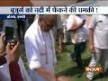 Congress leader Digvijay Singh threatens to throw old man into river