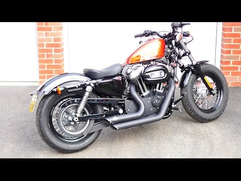 Harley Davidson 48 with Vance & Hines short shots starting up