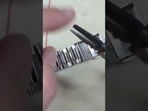 How to add and remove links on a folded metal type watch bracelet.