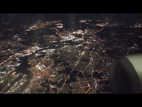 Landing in London at night. coming from Marseille on Ryan Air. You can see downtown London.