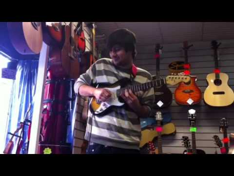 Easy Lover guitar solo on half size electric guitar by Dewi.