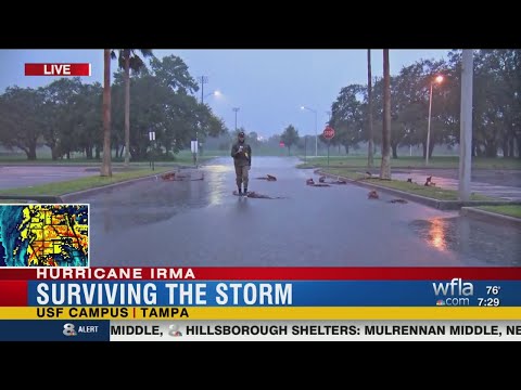 Storm Team 8's Ian Oliver surveys the conditions near USF