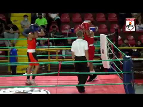 Jorge "Carnicero" Rivera (Ayarco) vs Isaac Mendoza (CODEA) pelea en 63 kilogramos.