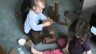 Play: Preschooler and Toddler Building With Blocks