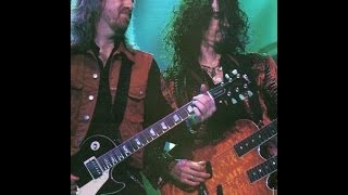 Joe Perry & Brad Whitford  guitarists of Aerosmith performing  " Rats in the Cellar  "