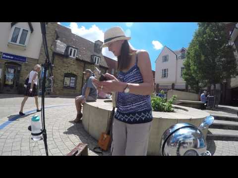Busking With Tennis Racket Diddley Bow
