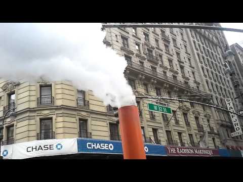 New York City up-close - massive volume of steam from street vent