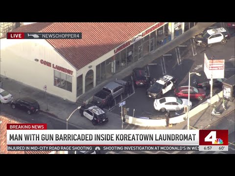 Armed man barricaded inside Koreatown laundromat