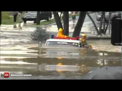 Fire truck drives through an 11-foot flood.