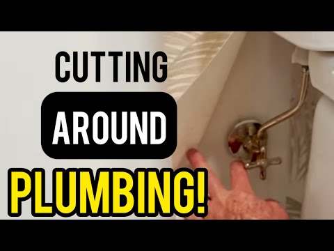 How to Work Around Toilet Plumbing When Installing Wallpaper