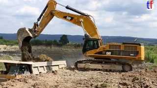 preview picture of video '**ACTION** CATERPILAR 385C LME Loads 775D & 775G Dump Trucks in a Quarry / Steinbruch, Germany.'