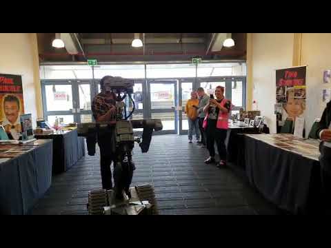 Johnny 5 singing and dancing with a chuckle brother at Warped Con 2019