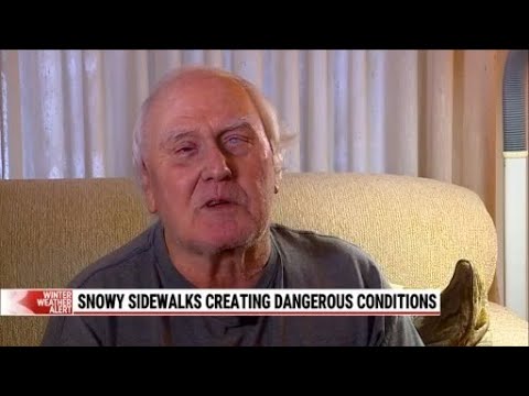 Grand Rapids pedestrians struggle on unplowed sidewalks