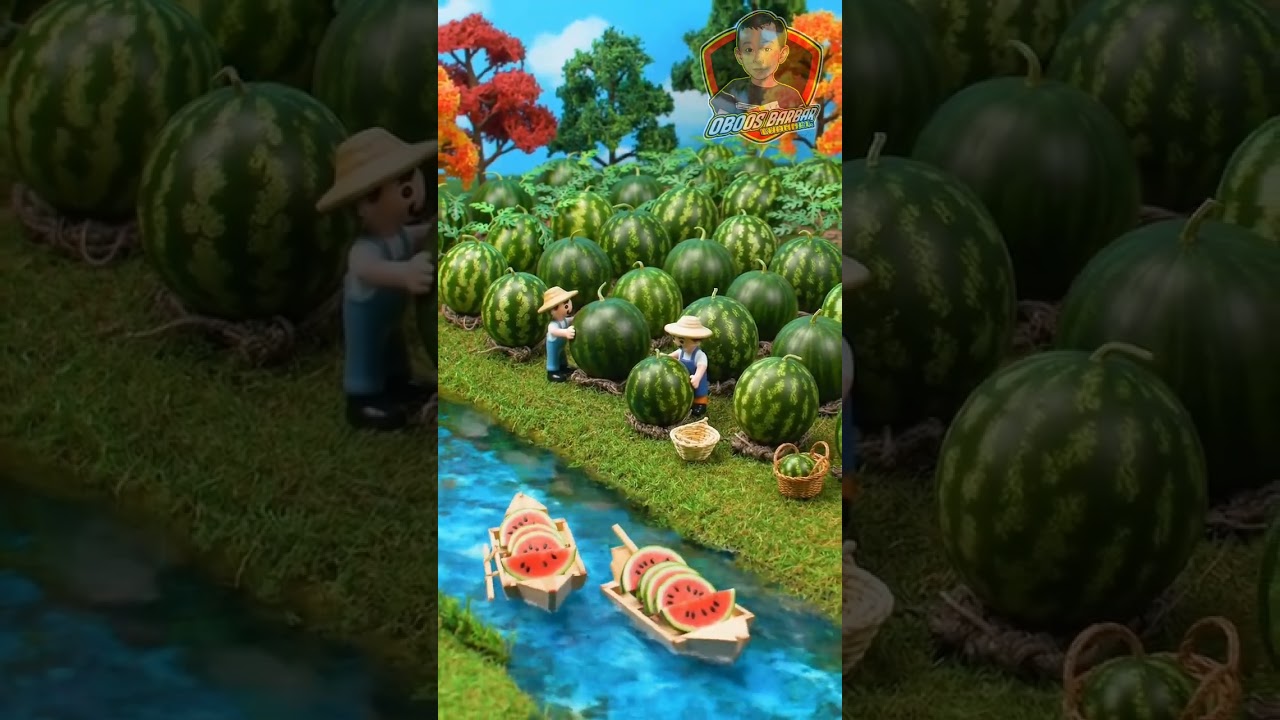 Diorama of farmers harvesting watermelons in a very large garden surrounded by a very clear river.