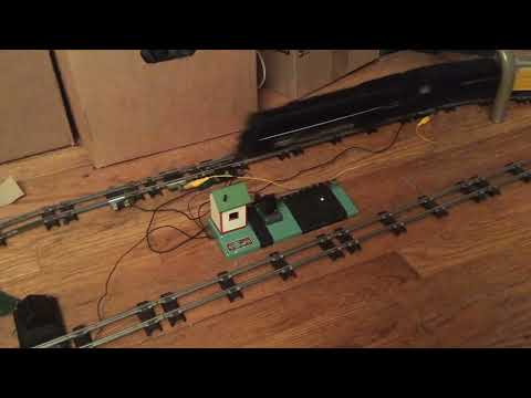 600 Crossing gate with bell activated with 697 track trip by American Flyer