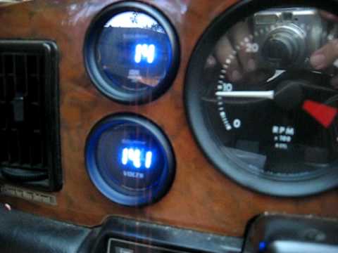 Auto Meter Cobalt Digital Voltmeter And Oil Pressure Gauge in a Jaguar XJ6