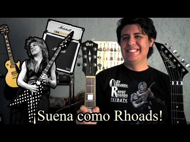 Vídeo relacionado con Axman Réplica de guitarra en miniatura de Randy Rhoads (Quiet Riot) - Regalos musicales - Escala ornamental 1/4 hecha a mano - Incluye una caja de exhibición, etiqueta de nombre y soporte para